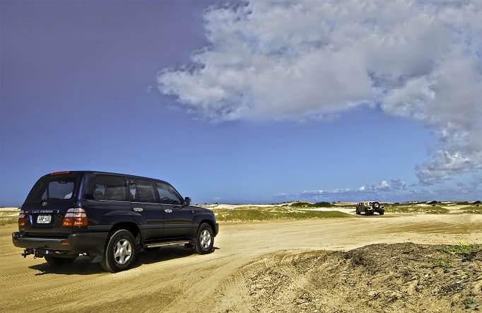 4WD on the beach in Worimi National Park. Photo: John Spencer/DPE