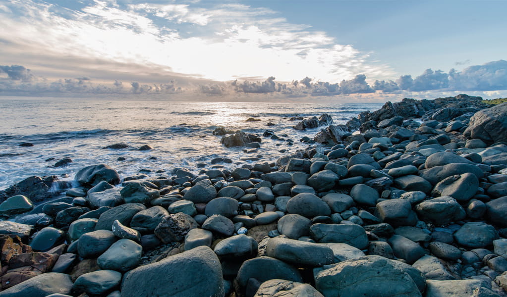 Rocky boulders and sea, Saltwater National Park. Photo: John Spencer, &copy; DCCEEW.