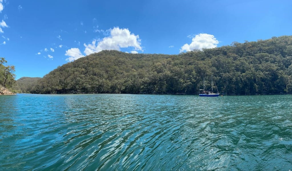 A view across the waterways of Ku-ring-gai Chase National Park with sailing vessel Birgitta in the distance. Photo: Nicholas Baillie Jackson &copy; Refuge Bay Charters