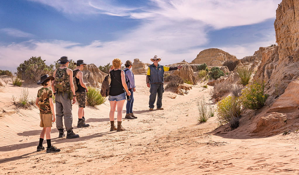 Visitors enjoy a guided tour of the lunette-like landscape in Mungo National Park. Credit: Aaron Davenport/DCCEEW &copy; Aaron Davenport