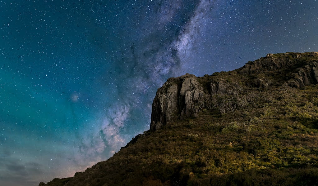 The spectacular deep-blue night sky filled with stars and the Milky Way, over The Nut, Tasmania. Credit: Benjamin Alldridge &copy; the photographer