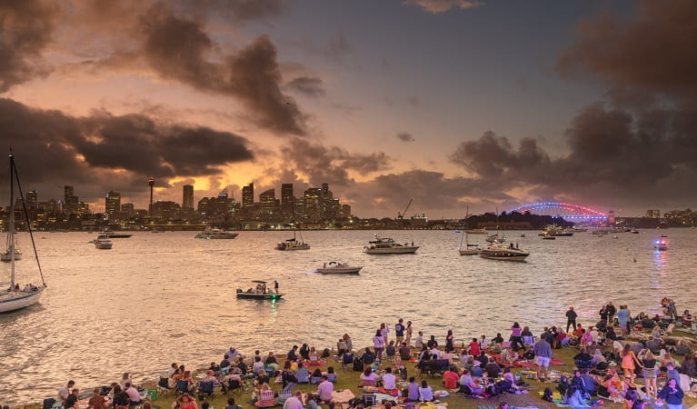 People at Clark Island waiting for the NYE firework display, Sydney Harbour National Park. Photo: Rob Mulally &copy; DPE