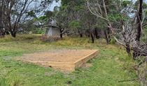 Gravel camping pad at Mowarry campground, Beowa National Park. Photo: DCCEEW, &copy; DCCEEW