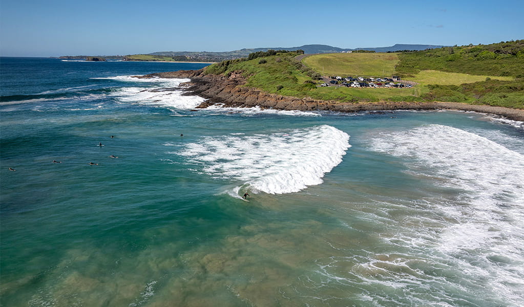 Surfers at Killalea Beach – The Farm. Photo: John Spencer/DCCEEW &copy; DCCEEW