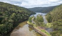 An aerial photo of Apple Tree picnic area surrounded by Apple Tree Creek, Cowan Creek and Ku-ring-gai Chase National Park bushland. Credit: John Spencer &copy; DCCEEW