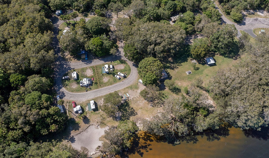 Aerial view of Mungo Brush campground and nearby Myall Lake in Myall Lakes National Park. Credit: John Spencer/DCCEEW &copy; DCCEEW