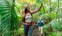 Walking through ferns on Byan Yangala loop walk. Photo Remy Brand &copy; Caraval Content