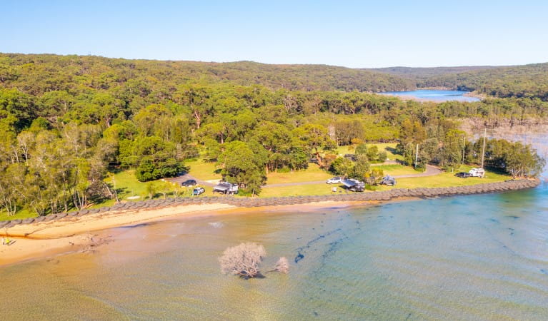 An aerial view of Bonnie Vale campground, river and sand spit in Royal National Park. Photo: Andrew Elliot &copy; DPE