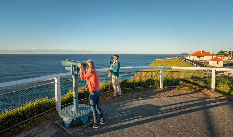 People whale watching from the lighthouse near Assistant Lighthouse Keepers Cottages. John Spencer/DPIE