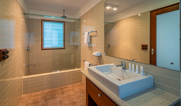 Spacious luxury bathroom with complimentary products, Mildenhall cottage. Photo: DPIE/John Spencer