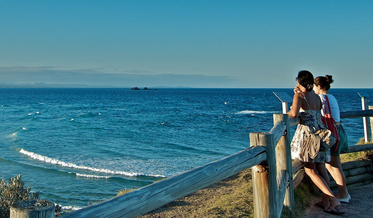 People enjoy the view from the lookout, Easterly Point lookout, Walgun Cape Byron State Conservation Area. Photo: John Spencer &copy; OEH