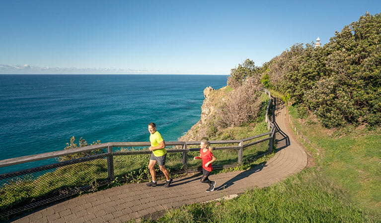 People jogging on the Walgun Cape Byron walking track. Photo: John Spencer &copy; OEH