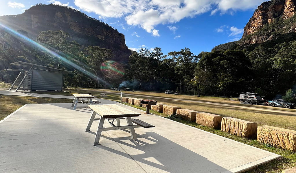 Picnic tables located on the wheelchair-accessible campsites. Credit: &copy; DCCEEW