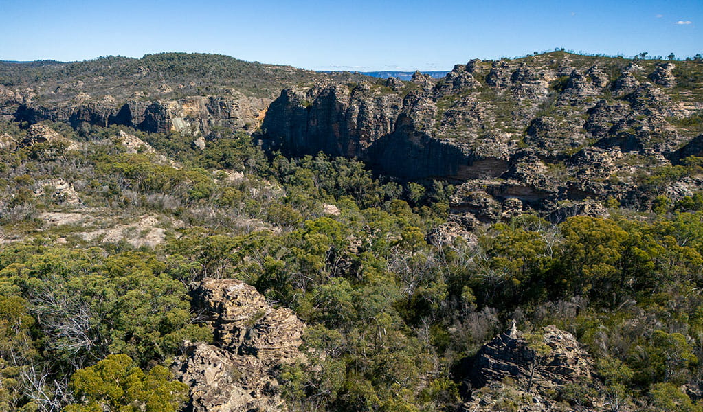 An aerial view of pagoda rock formations near Glow Worm Tunnel via Wolgan Valley loop, Wollemi National Park. Credit: John Spencer &copy; DCCEEW